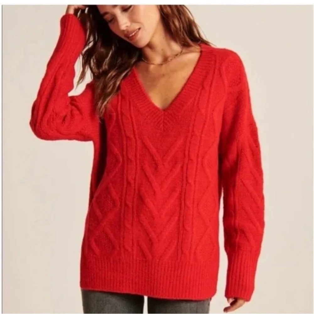 Over-sized red cable sweater